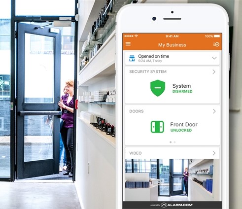 Alarm.com business access control app showing door lock status and employee entry management