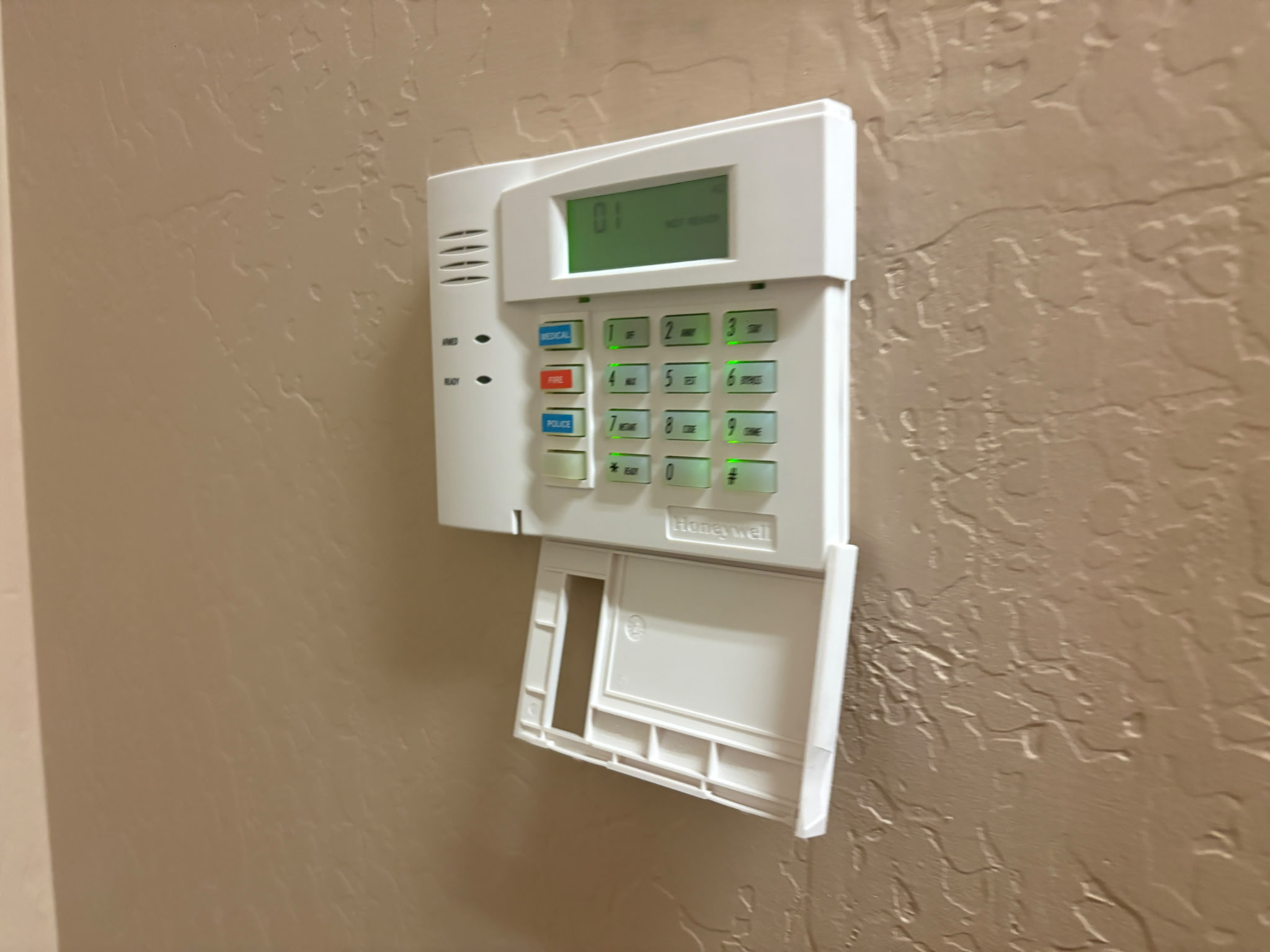 Honeywell Vista-style keypad that may indicate a reusable business alarm panel
