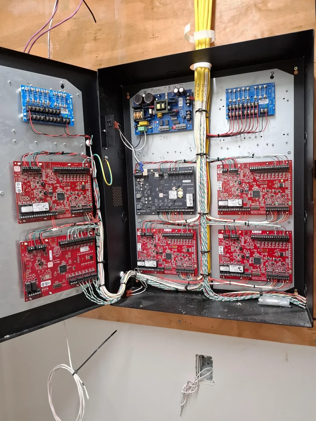 Access-control cabinet with labeled cabling and controller boards